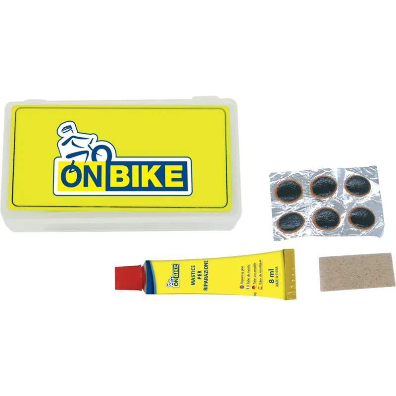 On Bike kit di riparazione con mastice, 6 pezze e raschietto Weekendaanbieding